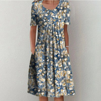 MAYA | ELEGANT FLORAL DRESS WITH TUMMY-FLATTERING LAYERS