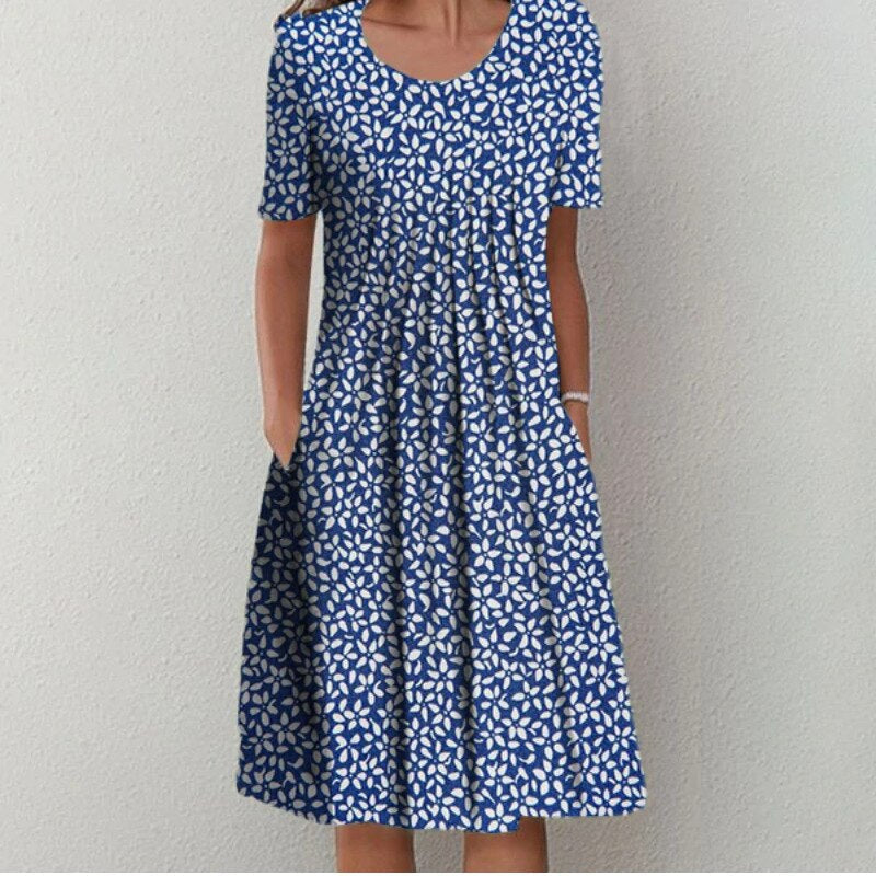 MAYA | ELEGANT FLORAL DRESS WITH TUMMY-FLATTERING LAYERS
